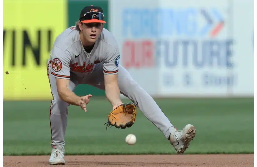 Coby Mayo fielding a ball at third base vs Pirates