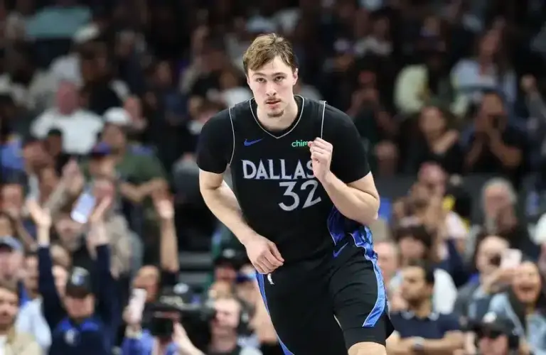 Dallas Mavericks forward Cooper Flagg (32) reacts after scoring against the Los Angeles Lakers.