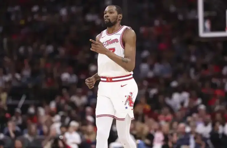 Houston Rockets forward Kevin Durant (7) reacts after scoring.