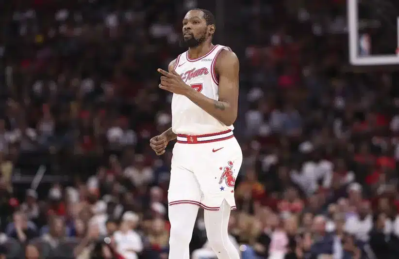 Houston Rockets forward Kevin Durant (7) reacts after scoring.