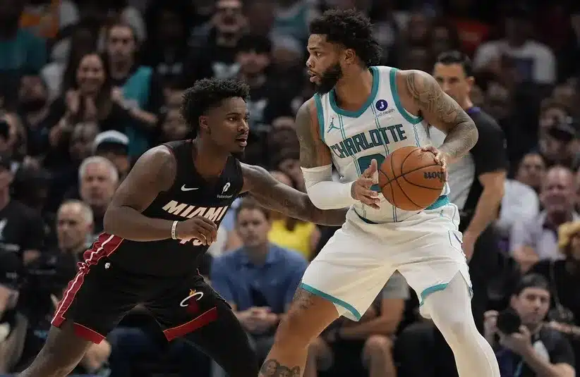 Charlotte Hornets forward Miles Bridges (0) looks to pass.