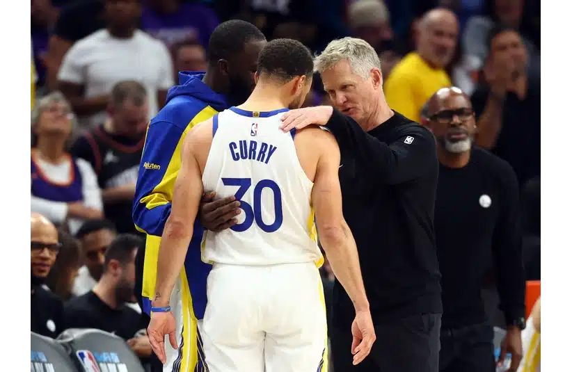 Steph Curry talking to Coach Kerr courtside, Golden State Warriors