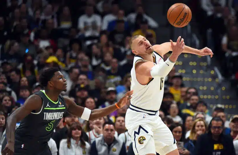 Denver Nuggets center Nikola Jokic (15) is fouled.