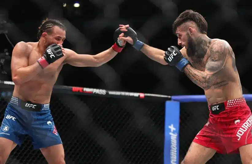 Kyler Phillips (red gloves) fights Charles Jourdain (blue gloves) during UFC Fight Night