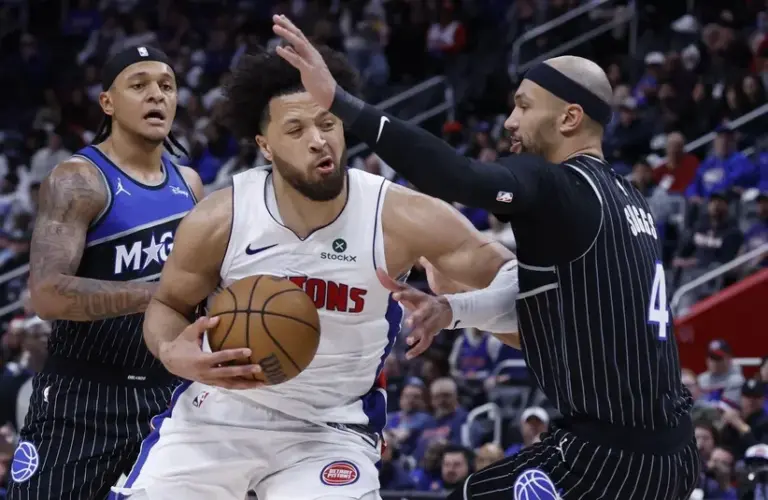 Detroit Pistons guard Cade Cunningham (2) is defended.