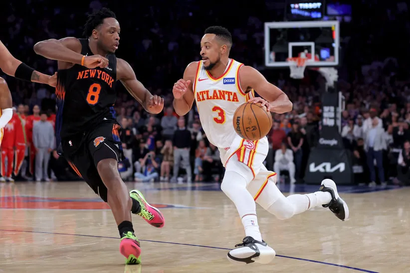 Apr 20, 2026; New York, New York, USA; Atlanta Hawks guard CJ McCollum (3) drives to the basket against New York Knicks forward OG Anunoby (8) during the fourth quarter of game two of the first round of the 2026 NBA Playoffs at Madison Square Garden.