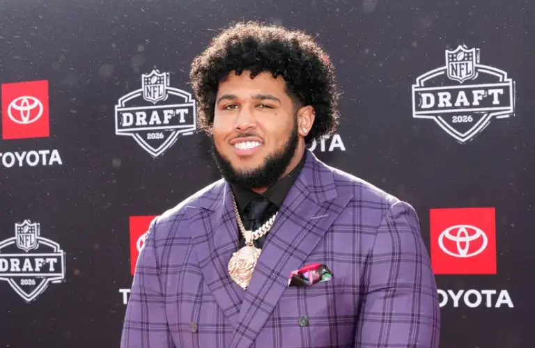 April 23, 2026; Pittsburgh — Alabama offensive tackle Kadyn Proctor poses on the red carpet before the 2026 NFL Draft at
