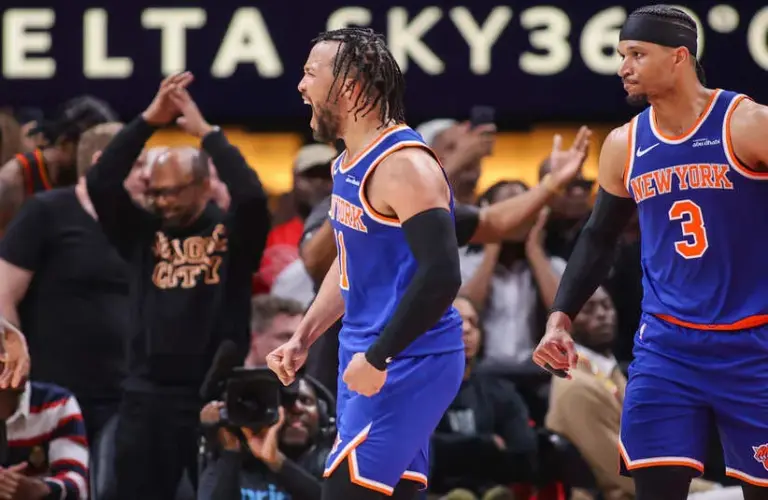 New York Knicks guard Jalen Brunson (11) reacts after a basket.