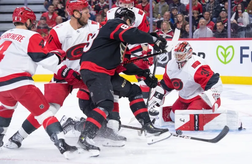 Ottawa Senators center Lars Eller (89) seizes the opportunity to capitalize on a rebound by Carolina Hurricanes goalie Frederik Andersen (31).