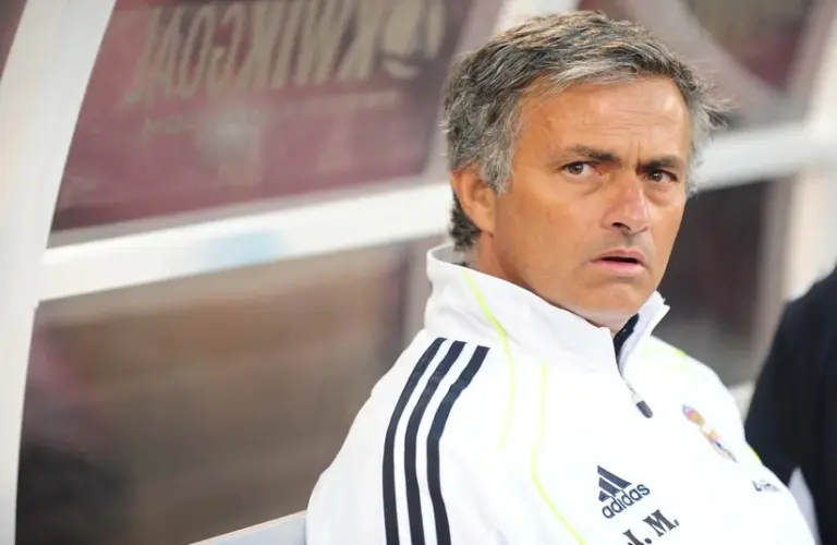 Jose Mourinho looking in the dressing room