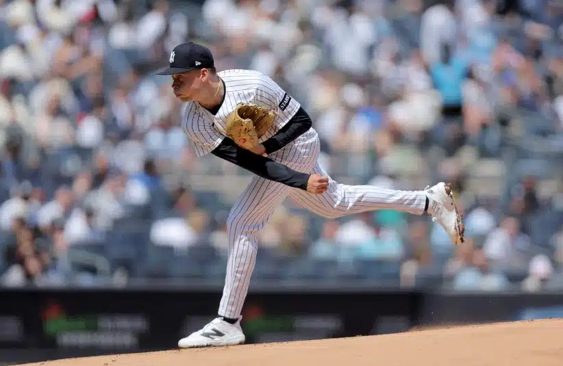 Apr 18, 2026; Bronx, New York, USA; New York Yankees starting pitcher Will Warren (29) follows through on a pitch against the Kansas City Royals during the first inning at Yankee Stadium.