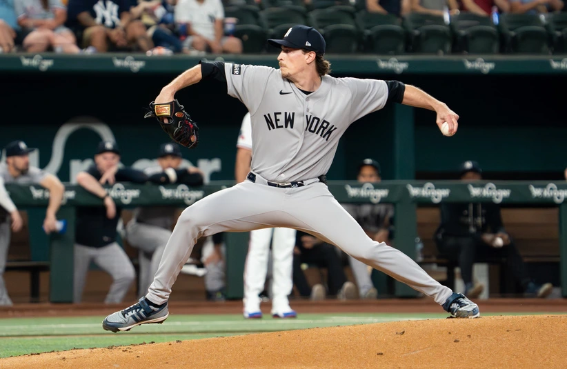 Apr 27, 2026; Arlington, Texas, USA; New York Yankees pitcher Max Fried (54) throws to home plate during the first inning against the Texas Rangers at Globe Life Field.