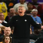 Golden State Warriors head coach Steve Kerr reacts. Steph Curry