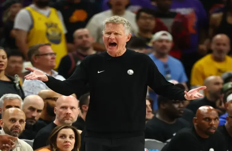 Golden State Warriors head coach Steve Kerr reacts. Steph Curry