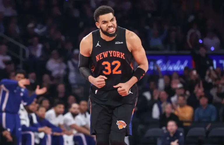 New York Knicks center Karl-Anthony Towns (32) celebrates after scoring against the Philadelphia 76ers. Ben Stiller