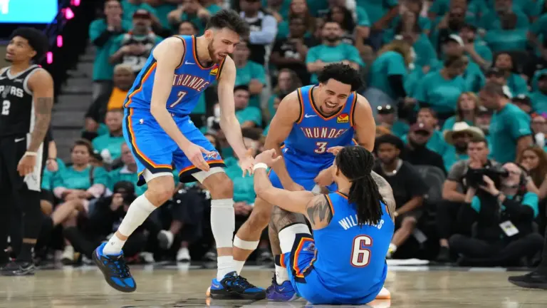 Oklahoma City Thunder center Chet Holmgren (7), guard Jared McCain (3) and forward Jaylin Williams (6) react.