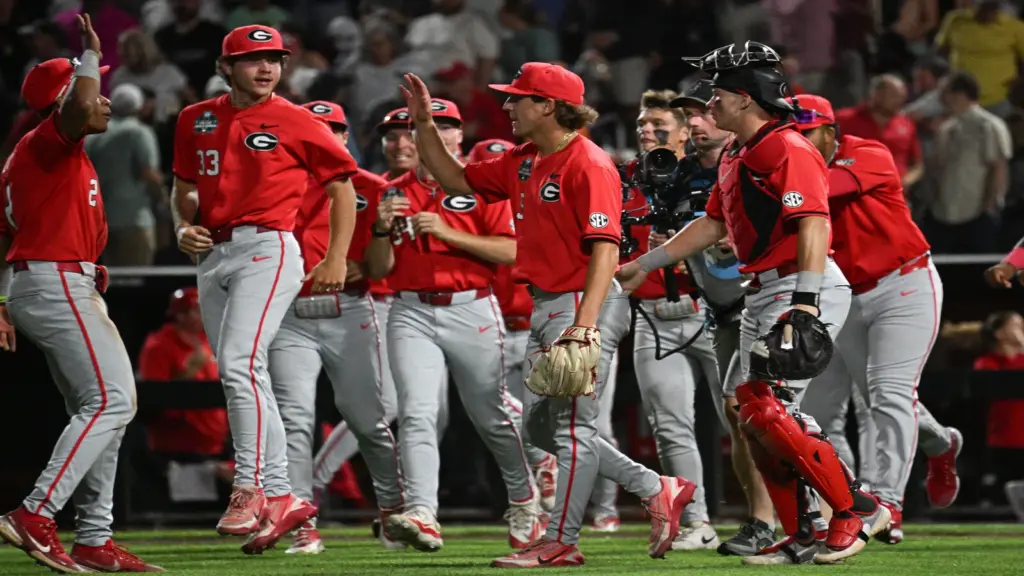 Jun 16, 2026; Omaha, NE, USA; The Georgia Bulldogs team celebrates the win against the Texas Longhorns at Charles Schwab Field.