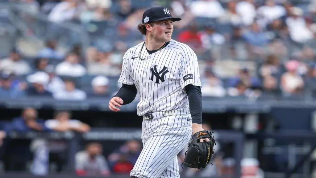 Jun 7, 2026; Bronx, New York, USA; New York Yankees starting pitcher Cam Schlittler (31) reacts after retiring the side in the fifth inning against the Boston Red Sox at Yankee Stadium.