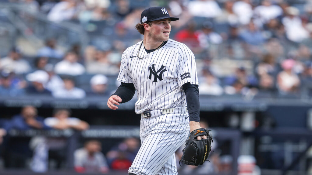 Jun 7, 2026; Bronx, New York, USA; New York Yankees starting pitcher Cam Schlittler (31) reacts after retiring the side in the fifth inning against the Boston Red Sox at Yankee Stadium.