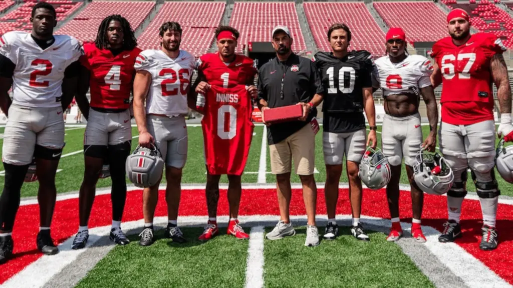 The 7 Captains at Ohio State with Head Coach Ryan Day.
