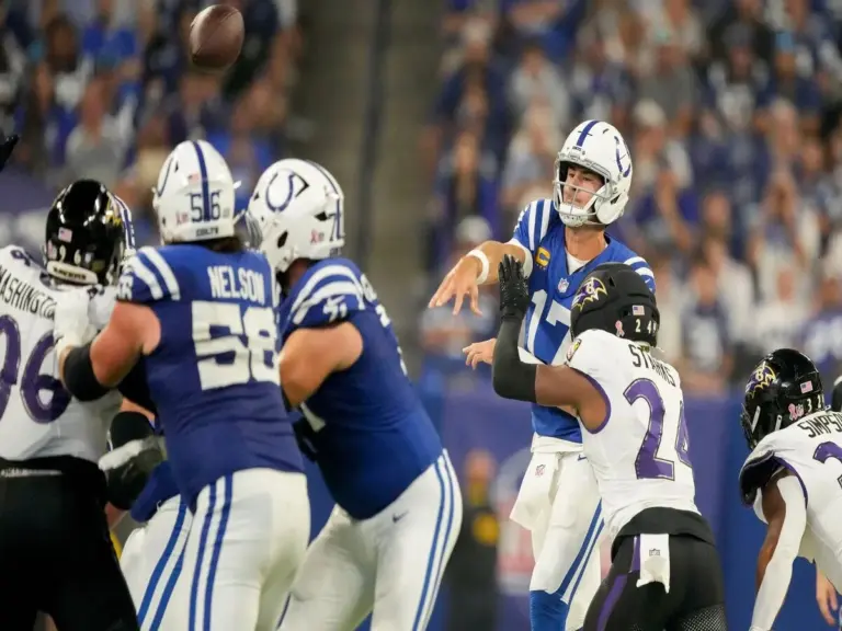 Colts QB Daniel Jones getting rid of the ball before being sacked against Ravens.